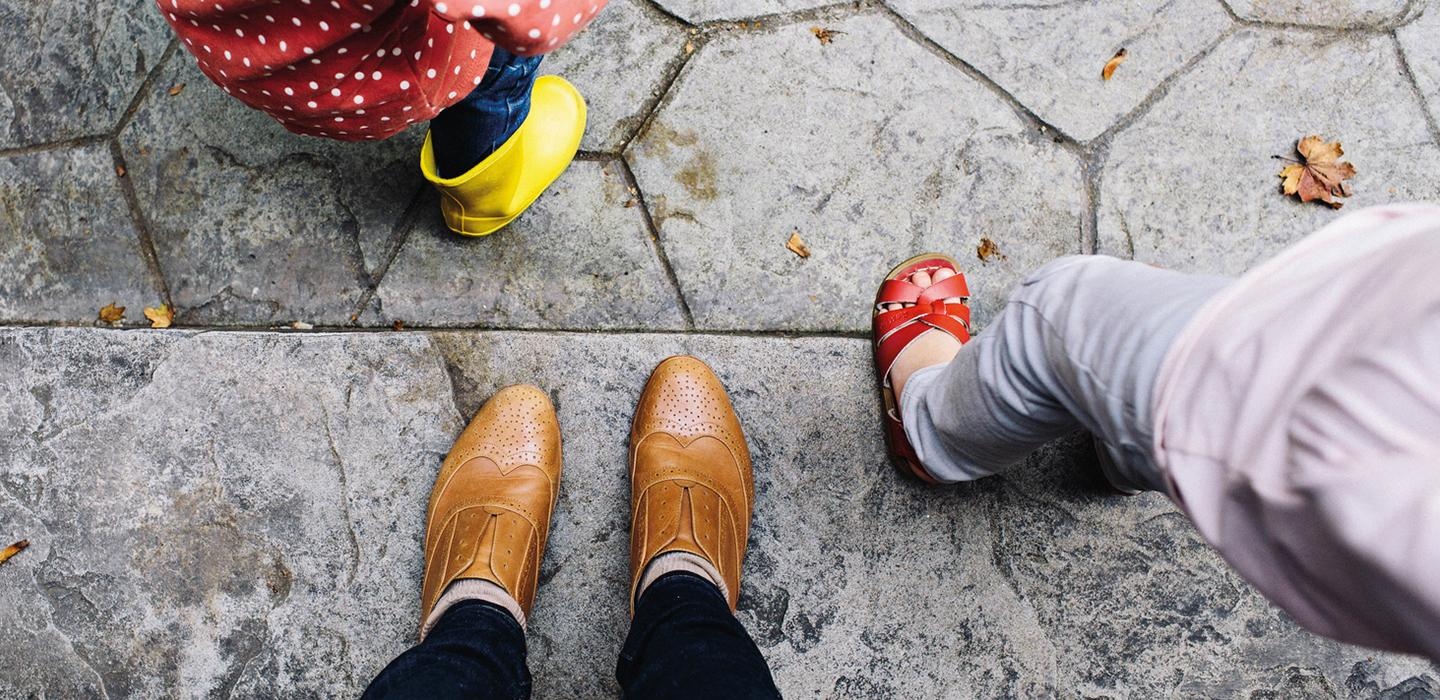 Children playing and are supervised by a parent